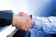 Corporate Deal - Blue Handshake | Stock photo